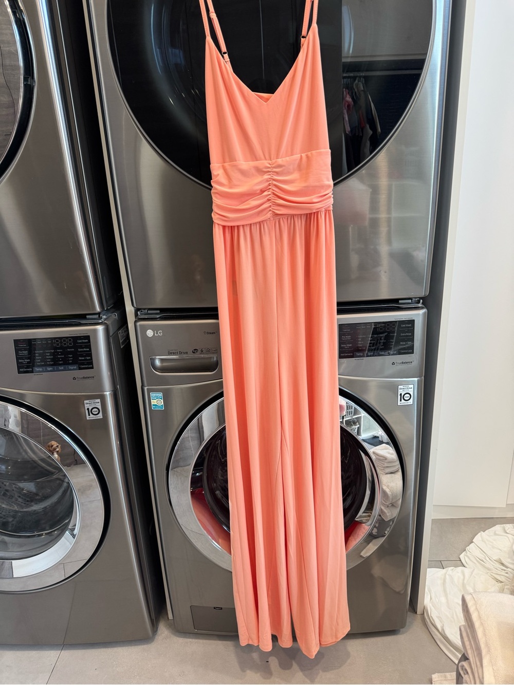 Bebe label on peach garment